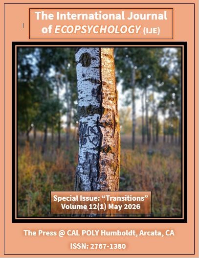 Picture of a poplar tree with a heart carved and initials in a forest